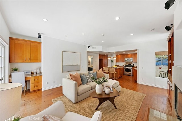 1114 Vincent St Unit A, Redondo Beach, CA 90277 - living area featuring light wood-style flooring and recessed lighting