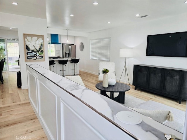 11143 Gonsalves Pl, Cerritos, CA 90703 - living area featuring light wood-style flooring and recessed lighting