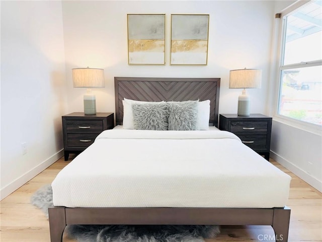 11143 Gonsalves Pl, Cerritos, CA 90703 - bedroom featuring baseboards and light wood-style flooring