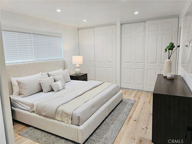 11143 Gonsalves Pl, Cerritos, CA 90703 - bedroom featuring two closets, light wood-style floors, and recessed lighting