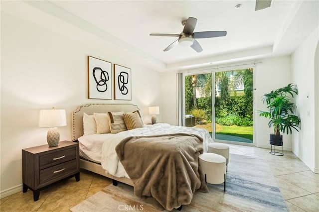 501 Newman Cir, Placentia, CA 92870 - bedroom with access to exterior, light tile patterned floors, a tray ceiling, and a ceiling fan