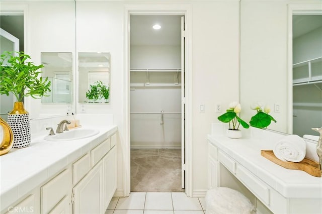 501 Newman Cir, Placentia, CA 92870 - bathroom with vanity, tile patterned floors, and a walk in closet