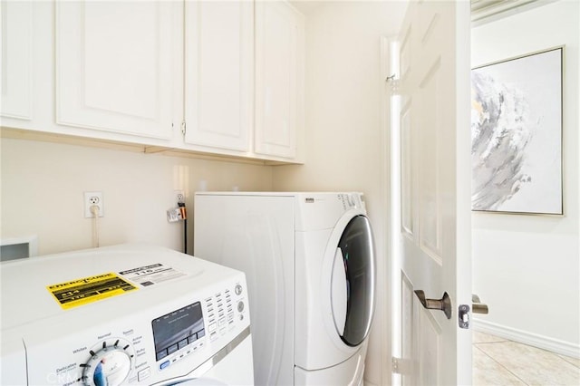 501 Newman Cir, Placentia, CA 92870 - washroom featuring cabinet space, washer and clothes dryer, and light tile patterned flooring