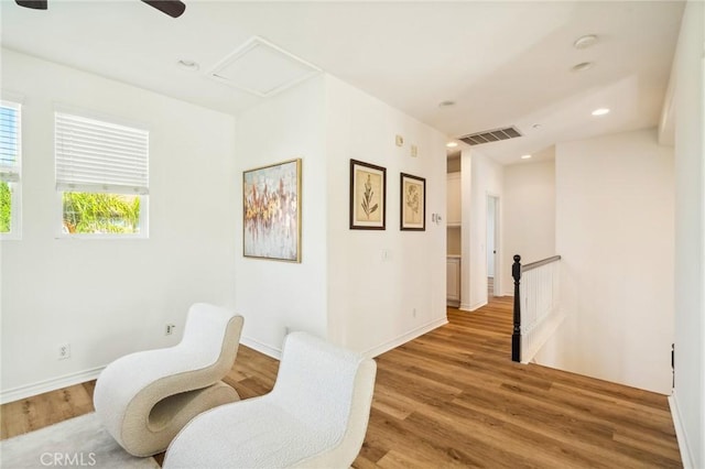 501 Newman Cir, Placentia, CA 92870 - sitting room with an upstairs landing, light wood finished floors, recessed lighting, and ceiling fan
