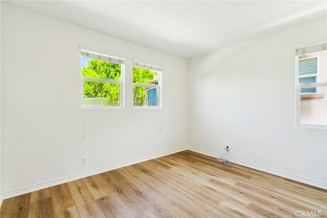 501 Newman Cir, Placentia, CA 92870 - empty room with baseboards and light wood-style flooring