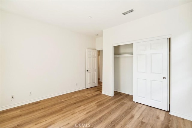 501 Newman Cir, Placentia, CA 92870 - unfurnished bedroom featuring light wood-style flooring and a closet