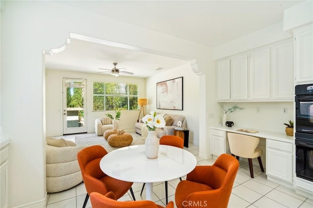501 Newman Cir, Placentia, CA 92870 - dining area featuring a ceiling fan, light tile patterned floors, and built in desk