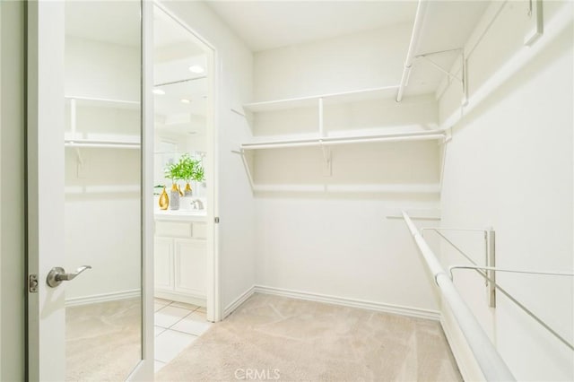 501 Newman Cir, Placentia, CA 92870 - spacious closet featuring tile patterned flooring and carpet floors
