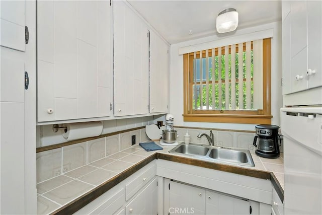 316 La Casita Dr, Twin Peaks, CA 92391 - kitchen with tile counters and white cabinets