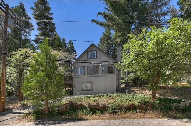 316 La Casita Dr, Twin Peaks, CA 92391 - view of side of home with a chimney