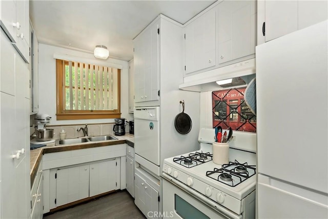 316 La Casita Dr, Twin Peaks, CA 92391 - kitchen with white appliances, under cabinet range hood, white cabinets, light countertops, and dark wood-type flooring