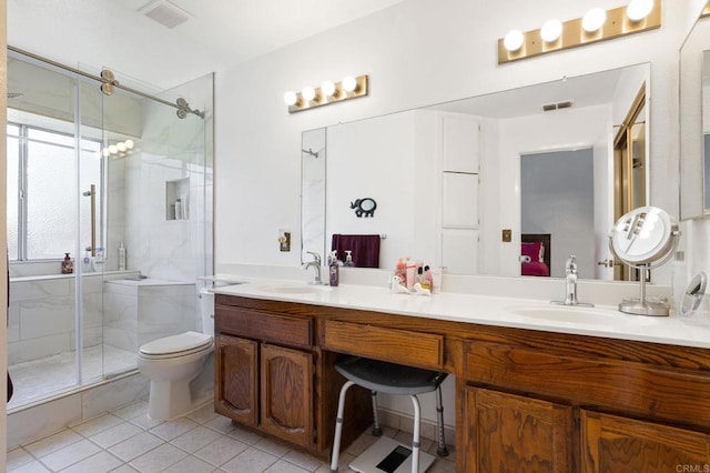 4068 De La Vina Way, Sacramento, CA 95823 - bathroom featuring a shower stall, tile patterned floors, and double vanity