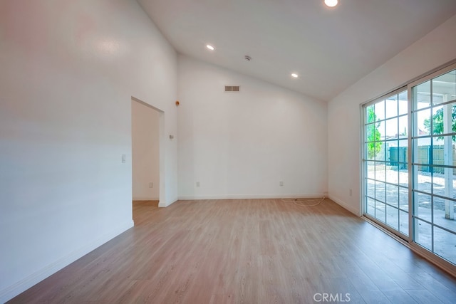 9063 Rosecrest Ln, Fontana, CA 92335 - unfurnished room with light wood finished floors, recessed lighting, and high vaulted ceiling