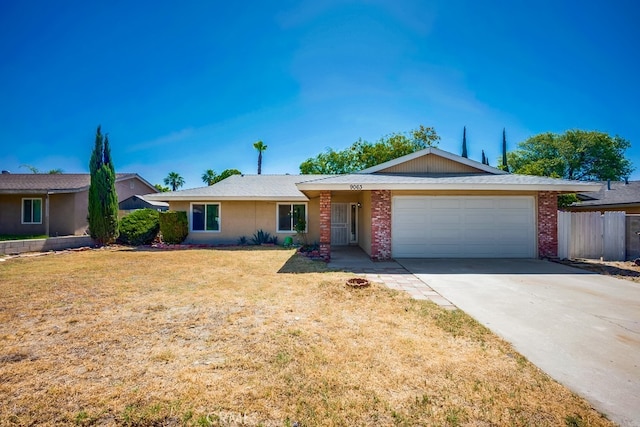 9063 Rosecrest Ln, Fontana, CA 92335 - ranch-style home with a garage and concrete driveway