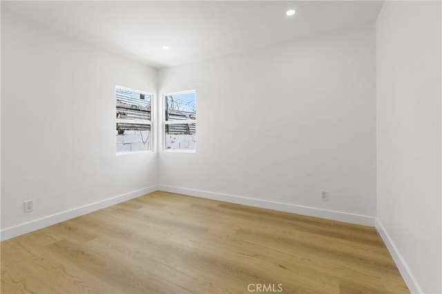 1736 N Mcdivitt Ave, Compton, CA 90221 - spare room featuring light wood-type flooring and recessed lighting