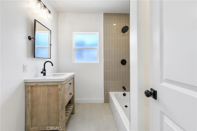 1736 N Mcdivitt Ave, Compton, CA 90221 - bathroom featuring vanity, tile patterned floors, and tub / shower combination
