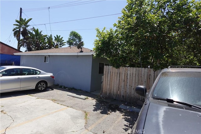 6910 Chanslor Ave, Bell, CA 90201 - view of side of home featuring stucco siding