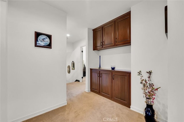 17262 Chase St, Northridge, CA 91325 - laundry area with light colored carpet and baseboards