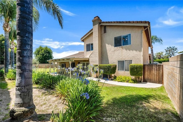 17262 Chase St, Northridge, CA 91325 - back of house featuring stucco siding