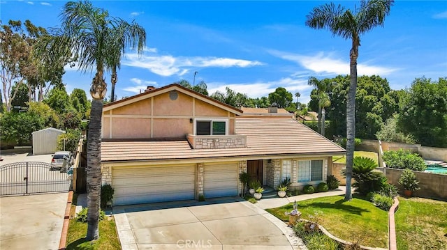 17262 Chase St, Northridge, CA 91325 - traditional-style home with a gate, driveway, a garage, a balcony, and stone siding