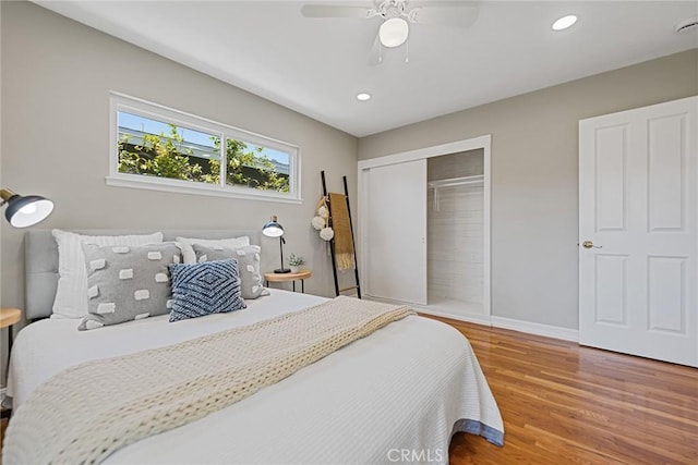 2781 Vuelta Grande Ave, Long Beach, CA 90815 - bedroom with a closet, wood finished floors, recessed lighting, and a ceiling fan
