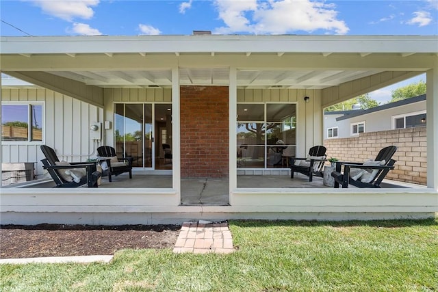 2781 Vuelta Grande Ave, Long Beach, CA 90815 - back of house with board and batten siding and brick siding