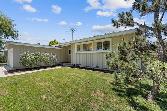 2781 Vuelta Grande Ave, Long Beach, CA 90815 - view of front of property with board and batten siding and a front yard