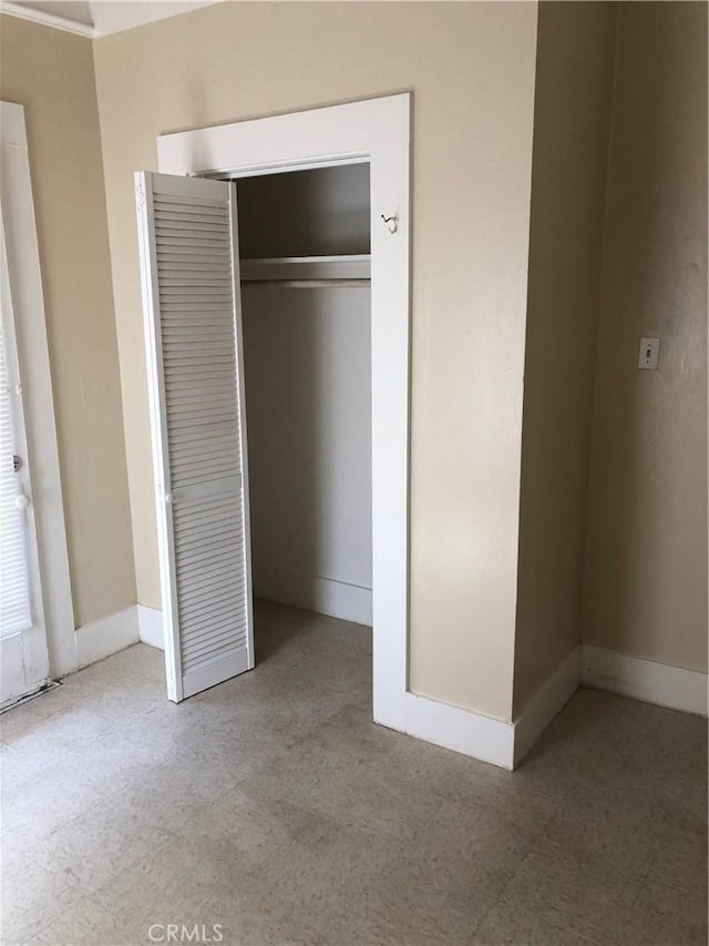 1029 Salem St, Chico, CA 95928 - unfurnished bedroom featuring a closet and tile patterned floors