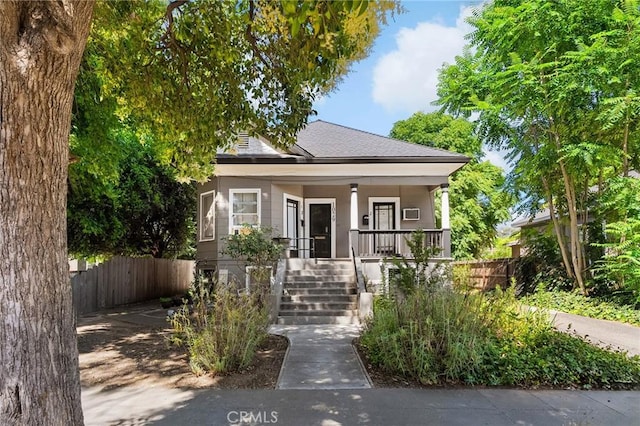 1029 Salem St, Chico, CA 95928 - view of front of home featuring a porch, stairway, and a shingled roof