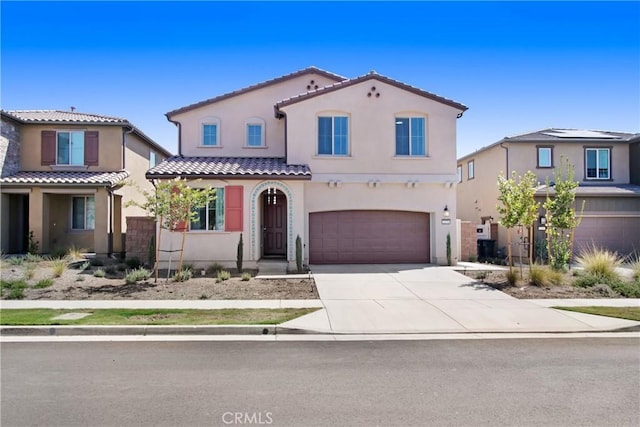 2278 Yuzu St, Corona, CA 92883 - mediterranean / spanish-style house with stucco siding, driveway, a garage, and a tiled roof