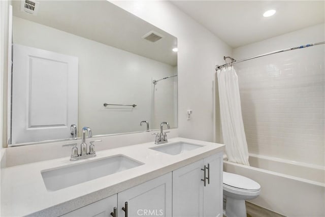 2278 Yuzu St, Corona, CA 92883 - bathroom featuring shower / bath combo, double vanity, and recessed lighting