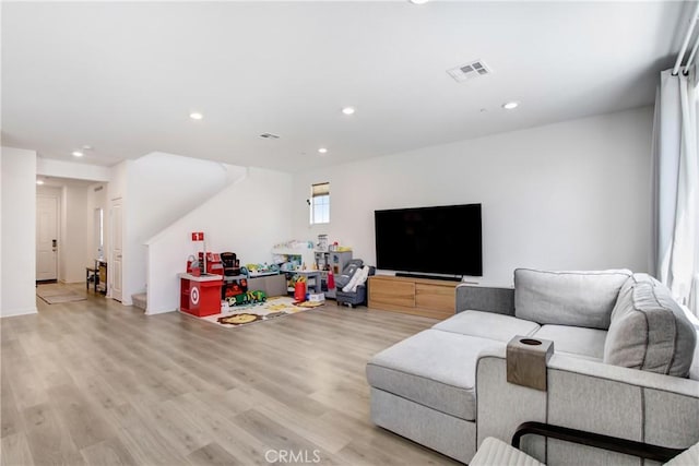 2278 Yuzu St, Corona, CA 92883 - living room with light wood-style flooring and recessed lighting