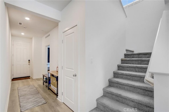 2278 Yuzu St, Corona, CA 92883 - stairway with wood finished floors and recessed lighting