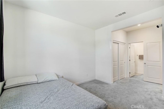 2278 Yuzu St, Corona, CA 92883 - carpeted bedroom with baseboards and a closet