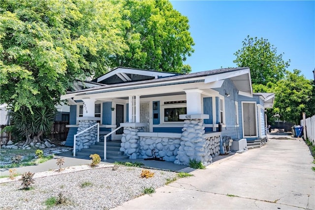 4216 Dalton Ave, Los Angeles, CA 90062 - bungalow-style home featuring covered porch and driveway