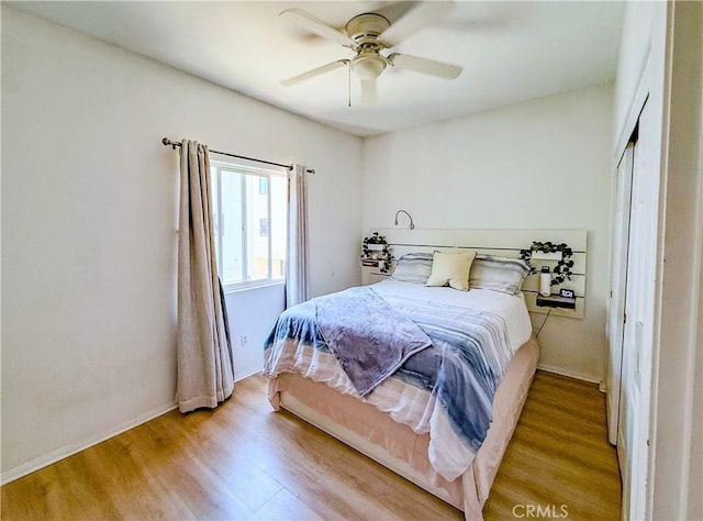 4216 Dalton Ave, Los Angeles, CA 90062 - bedroom with light wood-type flooring and ceiling fan