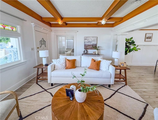 4216 Dalton Ave, Los Angeles, CA 90062 - living area featuring wood finished floors, beam ceiling, and coffered ceiling