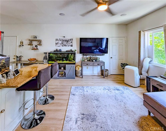 4216 Dalton Ave, Los Angeles, CA 90062 - living area featuring a ceiling fan and light wood finished floors