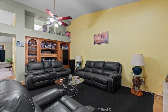 42012 57th St W, Lancaster, CA 93536 - living room featuring ceiling fan, vaulted ceiling, and wood finished floors