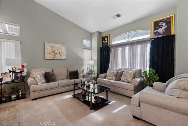 42012 57th St W, Lancaster, CA 93536 - living room featuring carpet flooring and high vaulted ceiling