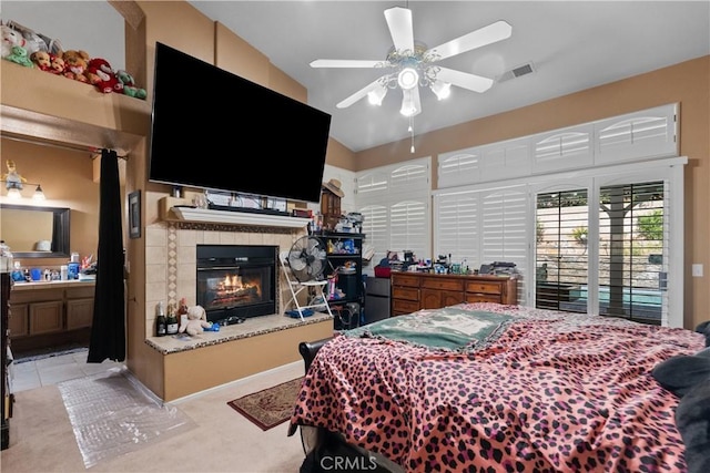 42012 57th St W, Lancaster, CA 93536 - carpeted bedroom with a glass covered fireplace, ensuite bathroom, and ceiling fan