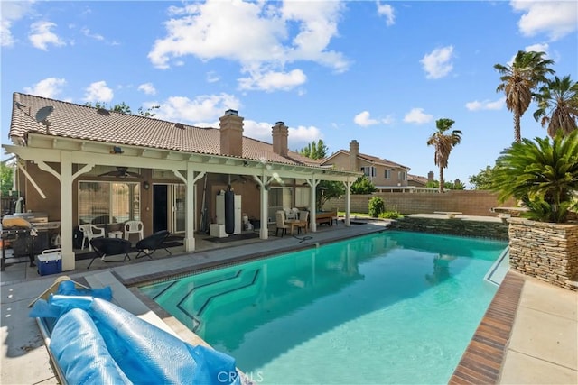 42012 57th St W, Lancaster, CA 93536 - view of swimming pool with ceiling fan, a fenced backyard, a patio, and a grill