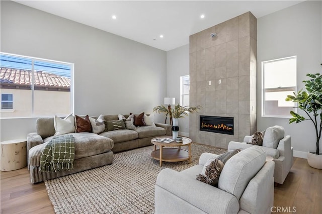 2405 Mathews Ave Unit C, Redondo Beach, CA 90278 - living area with wood finished floors, a fireplace, and recessed lighting
