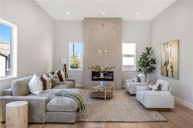 2405 Mathews Ave Unit C, Redondo Beach, CA 90278 - living room with wood finished floors, a fireplace, and recessed lighting