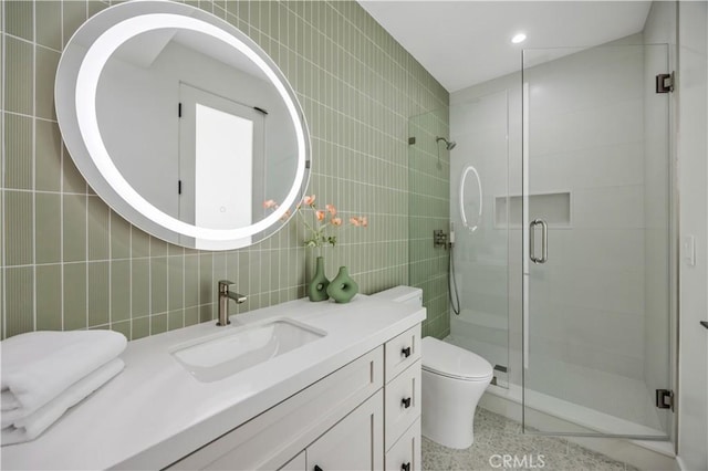 2405 Mathews Ave Unit C, Redondo Beach, CA 90278 - bathroom featuring tile walls, a shower stall, vanity, backsplash, and recessed lighting