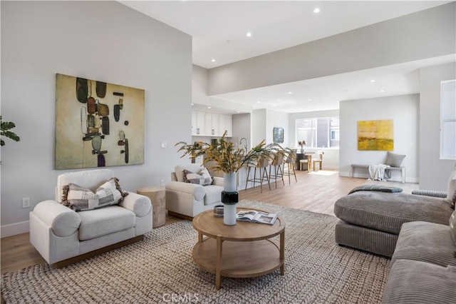 2405 Mathews Ave Unit C, Redondo Beach, CA 90278 - living room featuring light wood-type flooring and recessed lighting