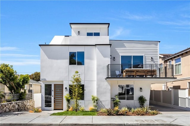 2405 Mathews Ave Unit C, Redondo Beach, CA 90278 - contemporary house featuring a balcony and stucco siding