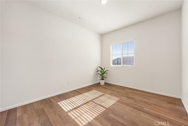 7305 Scrivia Ct, Bakersfield, CA 93311 - unfurnished room with wood finished floors and baseboards