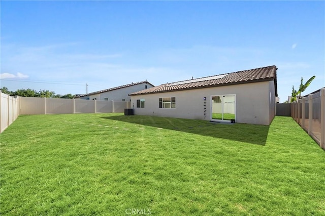 7305 Scrivia Ct, Bakersfield, CA 93311 - rear view of house featuring stucco siding and a fenced backyard
