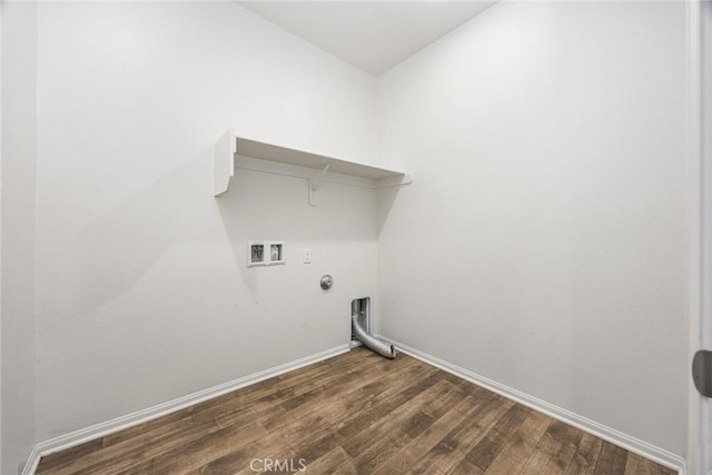 7305 Scrivia Ct, Bakersfield, CA 93311 - laundry room featuring gas dryer hookup, dark wood-style flooring, and hookup for a washing machine